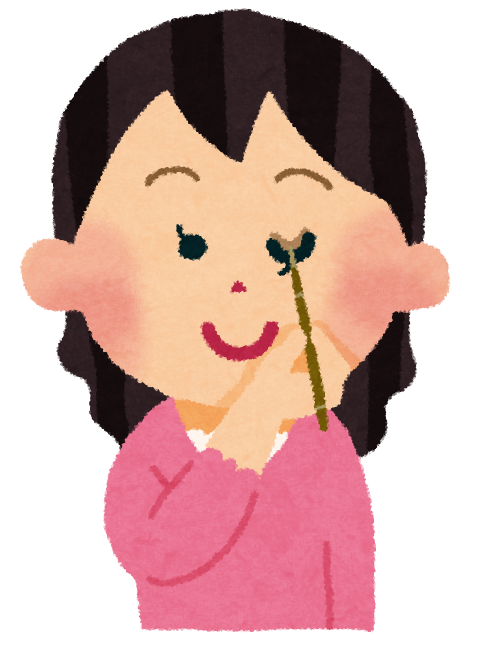 メイクをしている女性のイラスト