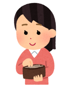 コインをお財布に入れている女性のイラスト