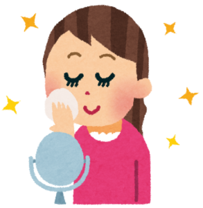 お化粧をしている様子のイラスト
